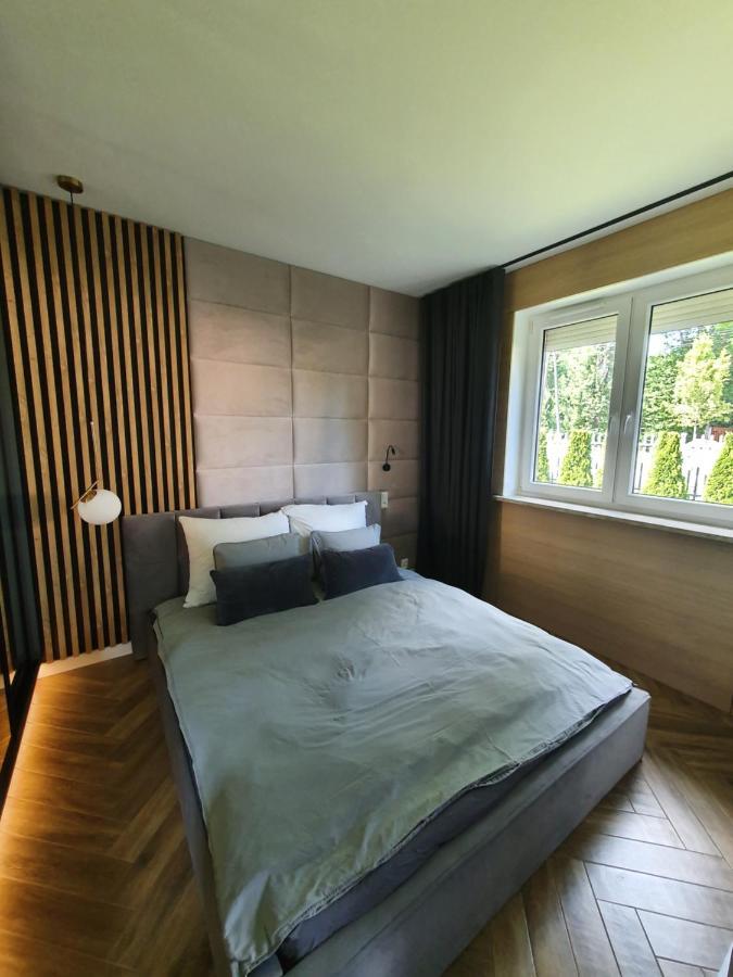 Lupoapartments Kaucja Лодзь Экстерьер фото